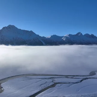 Aerial View of Pioneer Peak, Alaska, in Winter (Dolly In)