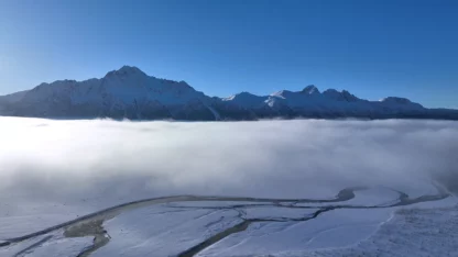 Aerial View of Pioneer Peak, Alaska, in Winter (Dolly In)